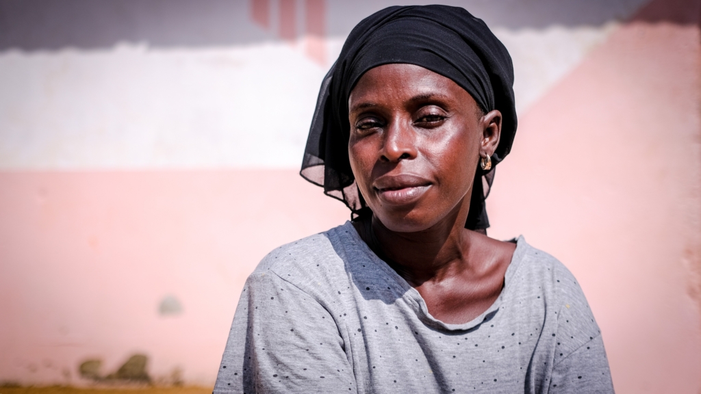 A survivor of domestic violence, Djénébou is now engaged for women's and girls’ empowerment in her community
