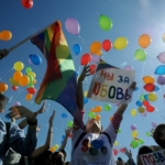 Gay rights activists release balloons as they take part in a flash mob devoted to the World Day Against Homophobia and Transphobia in St. Petersburg, on May 17, 2014. AFP PHOTO / OLGA MALTSEVA (Photo credit should read OLGA MALTSEVA/AFP via Getty Images)